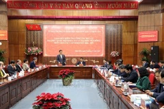 工作会谈场景。图自越通社