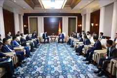 越南政府总理范明政同中国一流集团领导进行工作会谈
