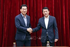 越南公安部长梁三光大将会见韩国国会行政安全委员会委员长Shin Jung Hoon。图自越通社