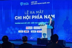 国家网络安全协会常务副主席阮明政中将发表讲话。图自越通社