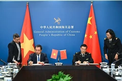 越中签署新鲜菠萝蜜出口议定书。图自越通社