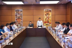 会议场景。图自越通社