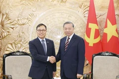 苏林会见韩国驻越大使崔英三。图自越通社