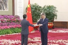 越南驻华大使范清平向中国国家主席习近平递交国书。图自越通社