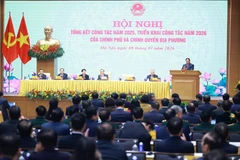 越南政府总理范明政在政府与地方政府2025年工作总结暨2026年工作部署全国视频会议上发表讲话。图自越通社