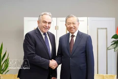 越共中央总书记苏林与美国前副国务卿库尔特·坎贝尔。图自越通社