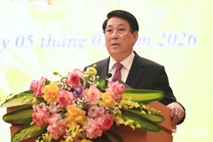 梁强代表国家领导对富寿省党委、政府、人民及武装力量在2025年取得的成就表示高度认可与祝贺。图自越通社