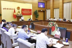 会议场景。图自越通社