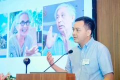 越南航天中心副教授范玉叠在研讨会上发言。图自越通社