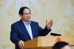 越南政府总理、指导委员会主任范明政在会议上发表讲话。图自越通社