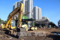 胡志明市3环路建设项目施工现场。图自越通社