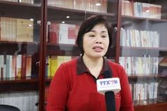 中国社会科学院马克思主义研究院教授、博士，越南问题专家潘金娥接受越通社记者采访。图自越通社