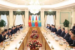 会谈场景。图自越通社