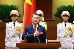 越南政府总理黎明兴宣誓就职。图自越通社