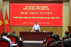 越共中央政治局委员、政府总理范明政主持会议。图自越通社