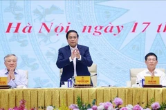 越南政府总理范明政出席会议。图自越通社
