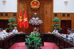 越南政府总理、越南区域与国际金融中心指导委员会主任范明政主持召开指导委员会会议。图自越通社