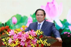 越南政府总理范明政在大会上发表讲话。图自越通社