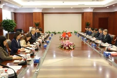 越中两国最高人民法院举行座谈。图自越通社