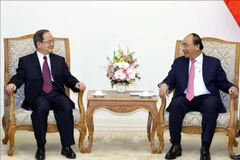 越南政府总理阮春福会见广西壮族自治区党委书记鹿心社