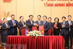 越南宁平省与老挝首都万象签署合作备忘录