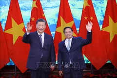 越南政府总理范明政会见中共中央总书记、国家主席习近平