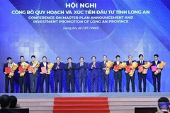政府总理范明政：隆安省应动员一切资源 同步且有效开发发展空间