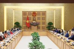 越南政府总理范明政会见联合国常驻越南协调员及部分联合国驻越代表机构首席代表