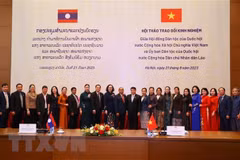 越老两国国会分享民族和可持续减贫经验
