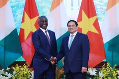 政府总理范明政会见科特迪瓦国民议会议长比克多戈