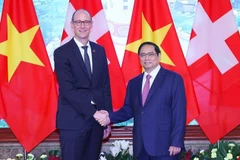 政府总理范明政会见瑞士联邦议会国民院议长