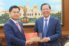 胡志明市人民委员会主席潘文买会见柬埔寨驻胡志明市总领事索达雷