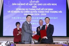 胡志明市外务厅与上海市人民政府外事办公室签署友好交流合作备忘录