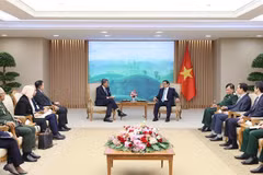 越南政府总理范明政会见马来西亚国防部长