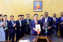 促进越坦两党两国传统友好关系