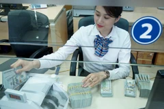 越南银行将美元卖出价上调490越盾 创有史以来新高