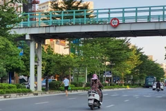 河内加大宣传力度 呼吁居民遵守《越南道路交通法》