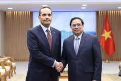 越南政府总理范明政会见卡塔尔外交大臣穆罕默德