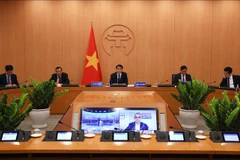 河内市人民委员会主席与世界各城市市长分享新冠肺炎疫情防控经验