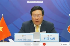 越南政府副总理兼外长范平明出席第23届东盟-欧盟外长会议