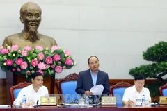 越南政府总理阮春在会上发言。
