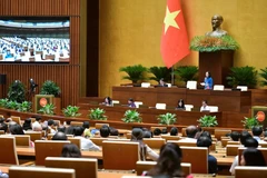 越南第十五届国会第八次会议讨论《未成年人司法》（草案）。图自越通社