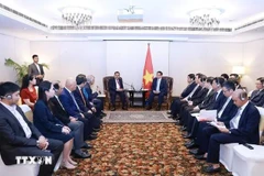 陪同范明政出访的计划与投资部长阮志勇于8月1日会见了印度领先企业之一——阿达尼集团董事长高塔姆·阿达尼（Gautam Adani）。图自越通社