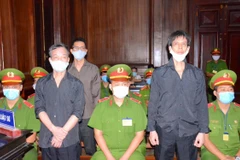 胡志明市人民法院开庭审理范志勇和其同案犯