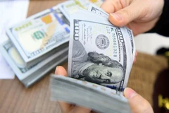 7月30日上午越盾对美元汇率中间价上调32越盾