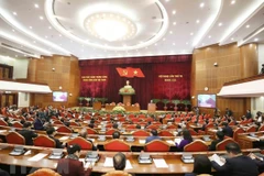 越共十三大：在新加坡越南专家谈越南经济和对外政策优先事项