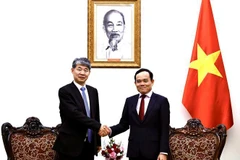 政府副总理陈流光会见国际原子能机构副总干事刘华