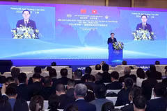 越南国会主席王廷惠出席促进越南与中国投资贸易合作政策法律论坛