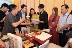 越南与中国(四川)经贸合作及贸易投资促进大会在河内举行