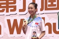 图为陈氏庆漓夺得女子太极剑金牌（图：体育报）